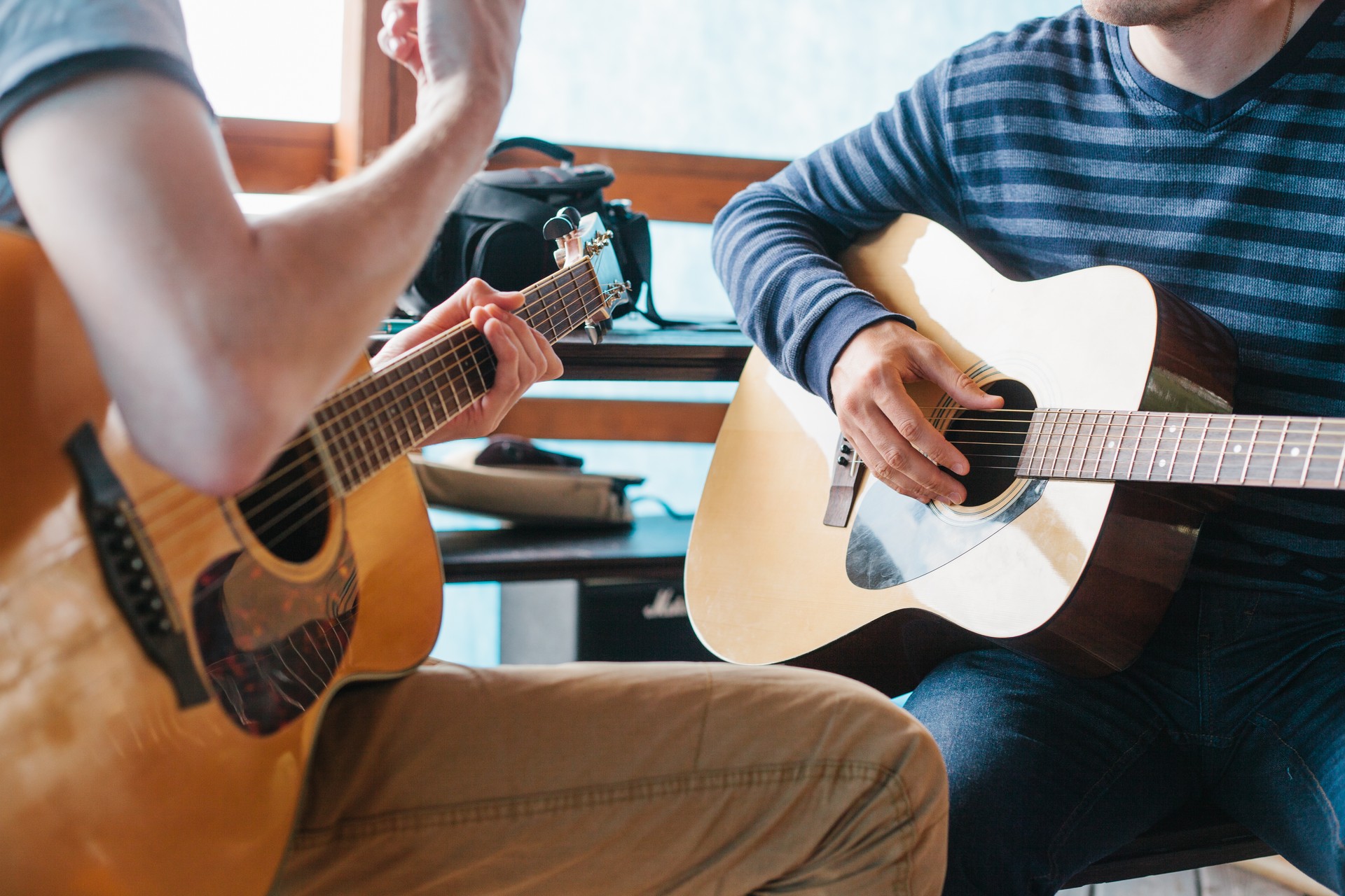 Learning to play the guitar. Music education and extra-curricular lessons.